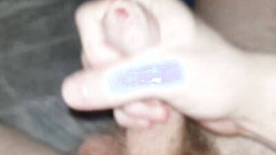 Hairy man is filming his pecker while stroking it for the camera
