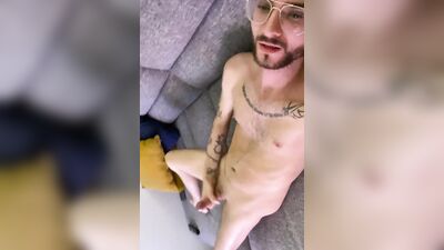 Nerdy guy is filming himself while sucking a hard pecker
