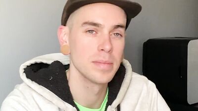 Kinky guy is reviewing different sex toys and dolls on webcam