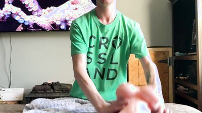 Kinky guy is reviewing different sex toys and dolls on webcam