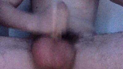 Dude with big balls is jerking off and shooting big loads