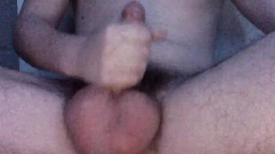 Dude with big balls is jerking off and shooting big loads