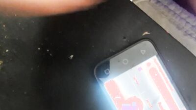 Horny guy watches gay porn on his phone and jerks off