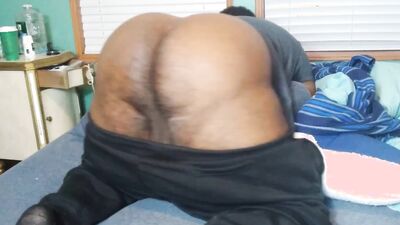 Black man spreads his ass cheeks and shows that big ass