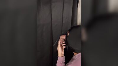 Masked gimp is passionately sucking a cock through that gloryhole