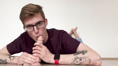Nerdy guy sucks that dildo and pushes it up his butthole