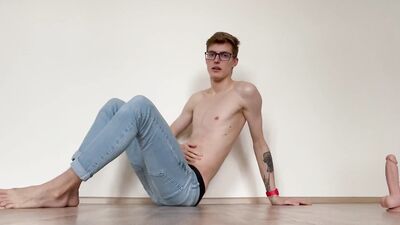 Nerdy guy sucks that dildo and pushes it up his butthole