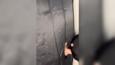 Masked gimp grabs a boner and sucks it through a gloryhole