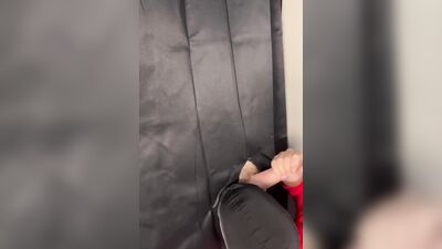 Masked gimp grabs a boner and sucks it through a gloryhole