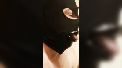 Masked guy sucks a dildo for his kinky webcam fans