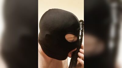 Masked guy sucks a dildo for his kinky webcam fans