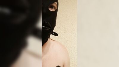 Masked guy sucks a dildo for his kinky webcam fans