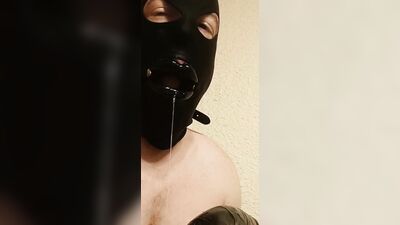 Masked guy sucks a dildo for his kinky webcam fans
