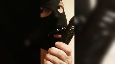 Masked guy sucks a dildo for his kinky webcam fans