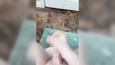 Dude is filming his hard cock with cell phone while jerking off