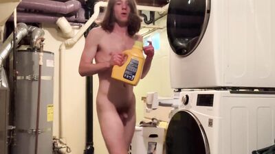 Long-haired twink grabs his hard cock and jerks off on the camera
