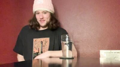 Long-haired guy gets naked and plays with himself in the bedroom