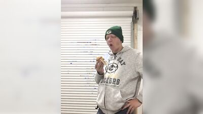 Chubby guy shows his belly while stuffing on the webcam
