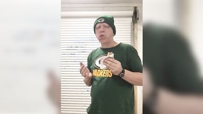 Chubby guy shows his belly while stuffing on the webcam