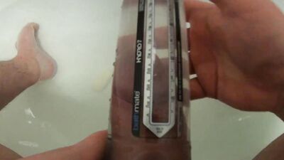 Kinky guy pushes his cock in a special toy in the bathroom