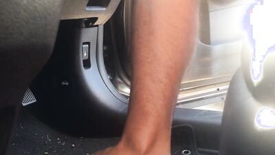 Kinky lad is filming his feet while chilling on the beach