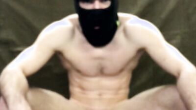 Handsome masked bloke is masturbating in front of the camera