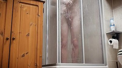 Amateur chap is filming himself while taking a shower in the bathroom