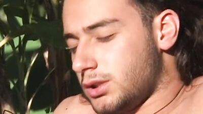Two naughty gay chaps are having sex in the backyard