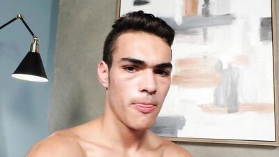 Good looking gay chap is masturbating in front of the camera