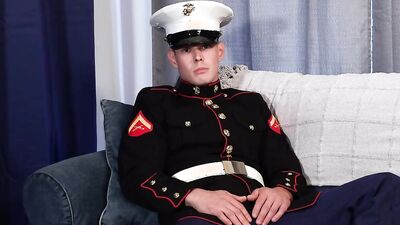 Military chap is stroking his big dick in front of the camera