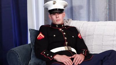 Military chap is stroking his big dick in front of the camera