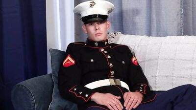 Military chap is stroking his big dick in front of the camera