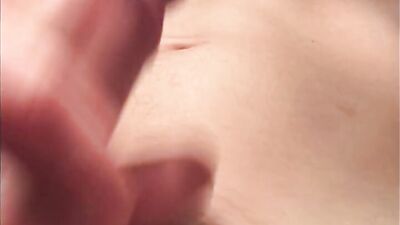 Close-up footage of a horny bloke stroking his pecker