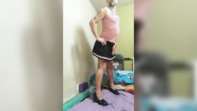 Longhaired femboy is flashing his ass in front of the camera