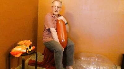Perverted grandpa is playing with a balloon in his solo video