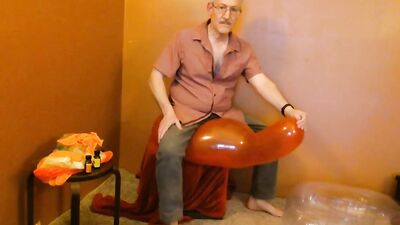 Perverted grandpa is playing with a balloon in his solo video