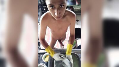 Naughty gay Latino is filming himself naked inside the kitchen