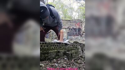 Amateur chap is rising big dildo deep inside the forest