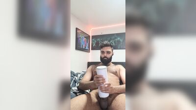 Amateur bearded bloke is shoving a cock into his favorite toy