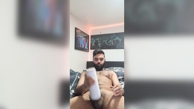 Amateur bearded bloke is shoving a cock into his favorite toy