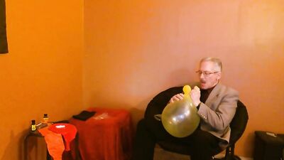 Perverted amateur grandpa playas with a balloon in his solo performance