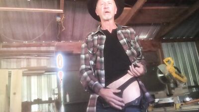 Horny cowboy is jerking off in front of the camera