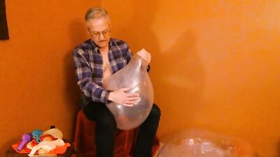 Perverted stepdad is playing with his balloons in this solo video