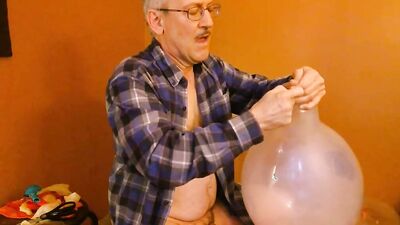 Perverted stepdad is playing with his balloons in this solo video