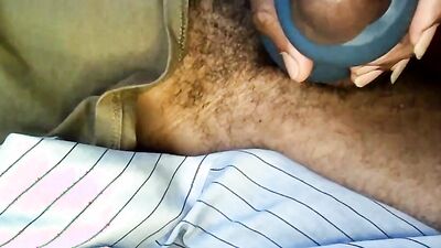 Amateur lad is stroking his BBC with a blue gummy toy