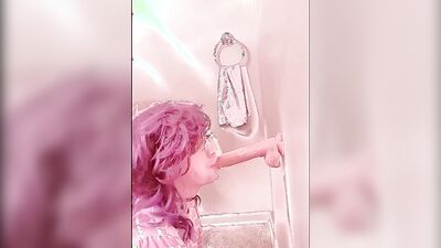 Pinky haired femboy sucks gummy dildo in this homemade video