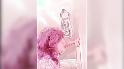 Pinky haired femboy sucks gummy dildo in this homemade video