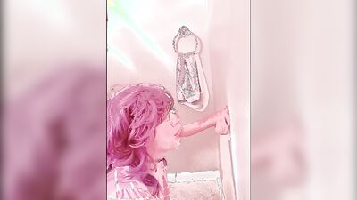 Pinky haired femboy sucks gummy dildo in this homemade video