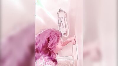 Pinky haired femboy sucks gummy dildo in this homemade video