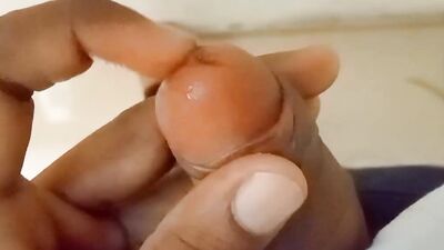 Lad plays with a pecker in this close-up video